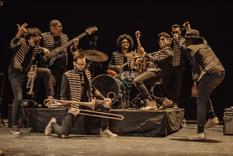 Los Wizzards are trumpet player Coombs (left), bassist Rafa, trombonist Tony, drummer Juseph, cuatro player Wizzmer, rapper Samy Hawk, and singer Roy G. - PHOTO BY DAIS SARCOS