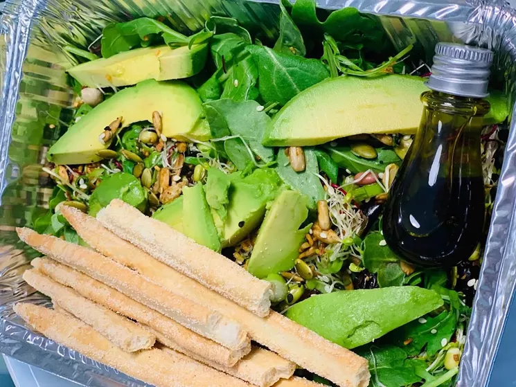 Arugula salad with Italian grissini sticks from Folklore Culinary. - PHOTO COURTESY OF FOLKLORE CULINARY