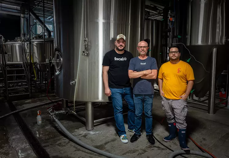 Focal Beer Cafe general manager Leo Diaz (left), Humberto Perez, and head brewer Carlos de la Rosa (right) stand inside the Focal Beer Cafe brewhouse which took over Bousa Brewing Co. in July 2019. - . - PHOTO COURTESY OF FOCAL BEER CAFE