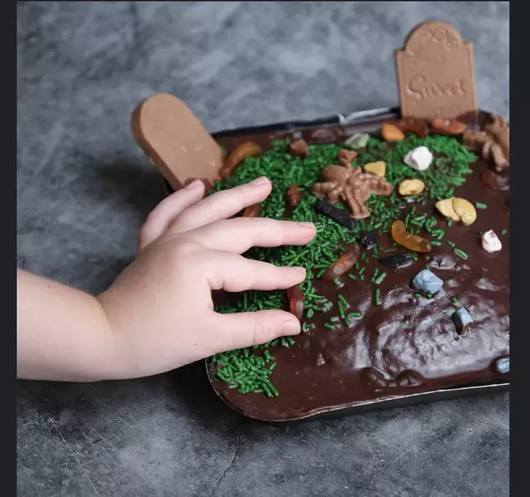 Build your own graveyard cake for a fun Halloween at home. - PHOTO COURTESY OF GARCIA NEVETT CHOCLATIER DE MIAMI