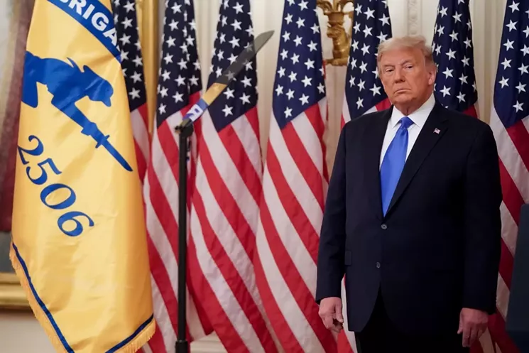 Trump honored veterans of the 1961 Bay of Pigs invasion and announced new sanctions against Cuba in September 2020. - PHOTO BY JOSHUA ROBERTS/GETTY