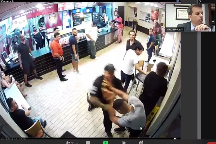 Security footage showing the guard tussling with Raymond Ortega was broadcast during the Zoom court hearing. - SCREENSHOT VIA ZOOM
