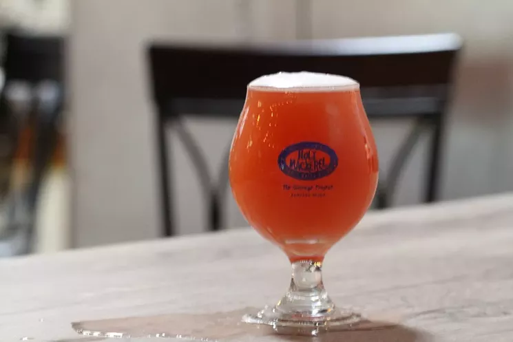With an array of brews, barbecue, and community events, Holy Mackerel has quickly become a hot spot in Wilton Manors. - PHOTO BY NICOLE DANNA