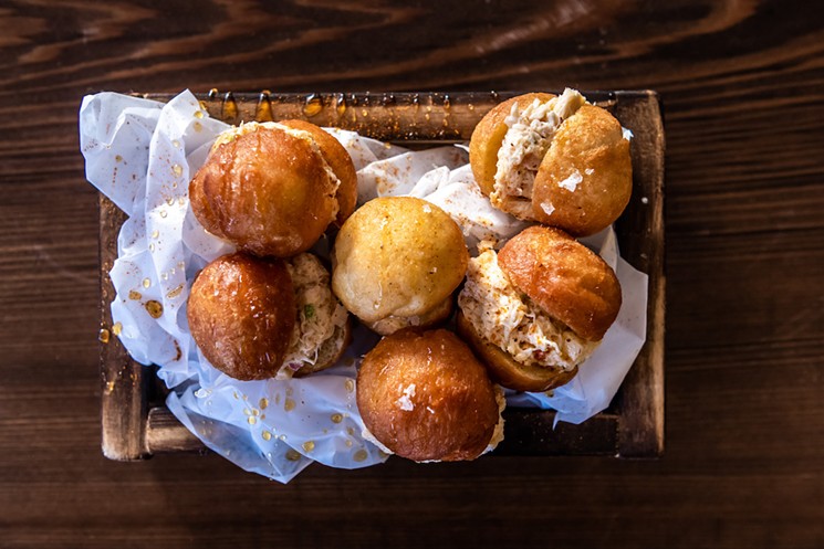 Rivertail's crab doughnuts are a specialty of the house. - PHOTO COURTESY OF BREAKWATER HOSPITALITY GROUP
