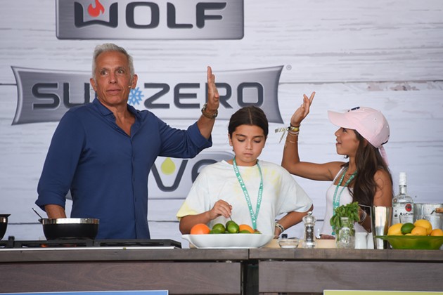 Geoffrey Zakarian and daughters at the Grand Tasting Village. - PHOTO BY MICHELE EVE SANDBERG