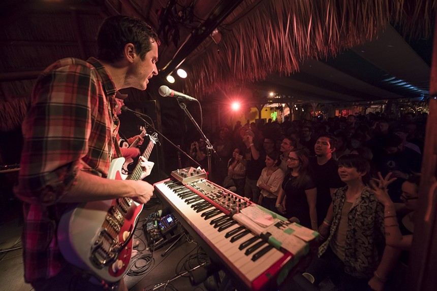 Clap Your Hands Say Yeah performing under Gramps' palapa-covered stage - PHOTO BY ALEX MARKOW