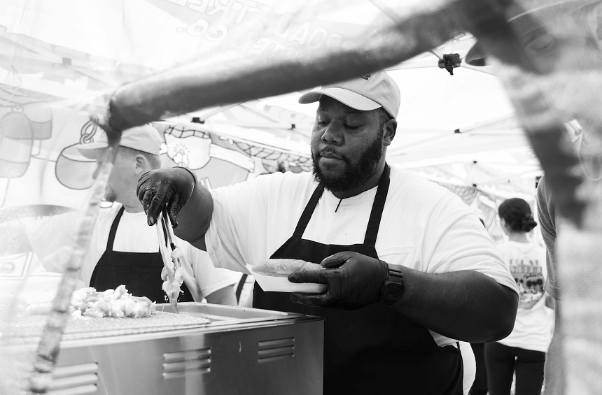 The chefs at Smorgasburg Miami prepare special dishes in honor of Anthony Bourdain Day. - PHOTO COURTESY OF THE KITCHEN PEOPLE
