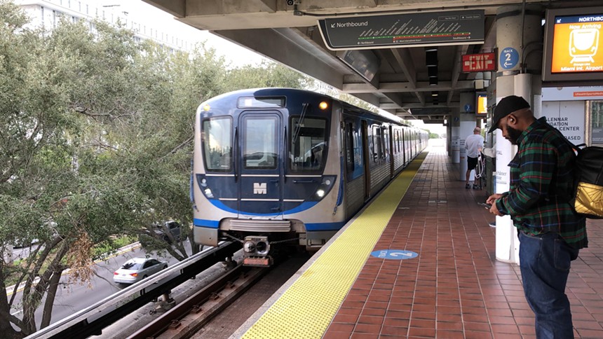 A Metrorail train pulling up to the University Station platform