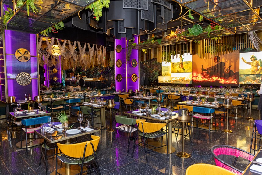 The gold and purple interior dining room of Cvi.che 105 in Coral Gables.