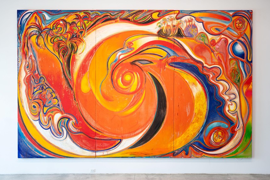 Abstract painting of red, orange, yellow, and blue colors swirling together