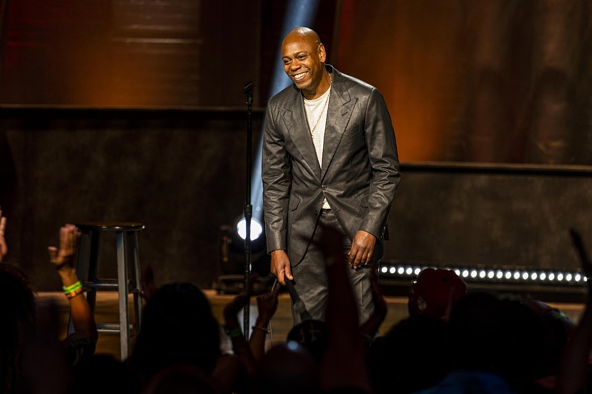 Comedian Dave Chappelle on stage