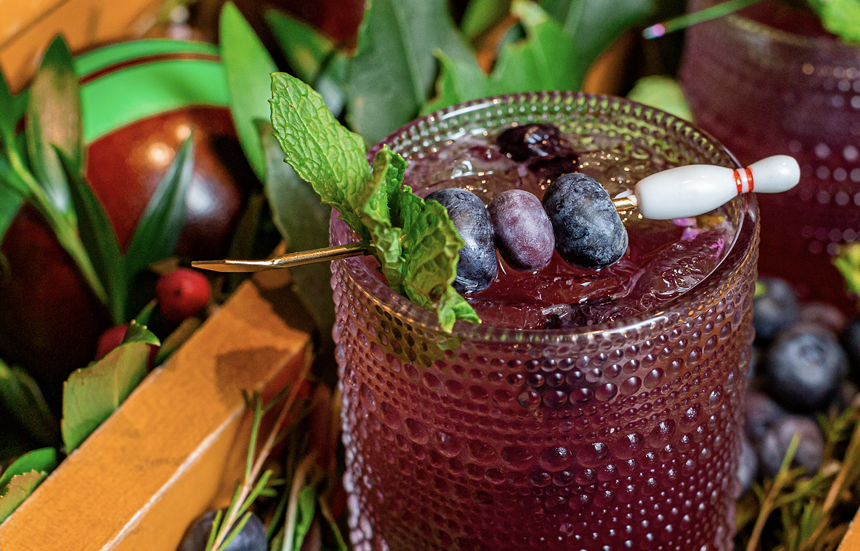 A purple blueberry cocktail