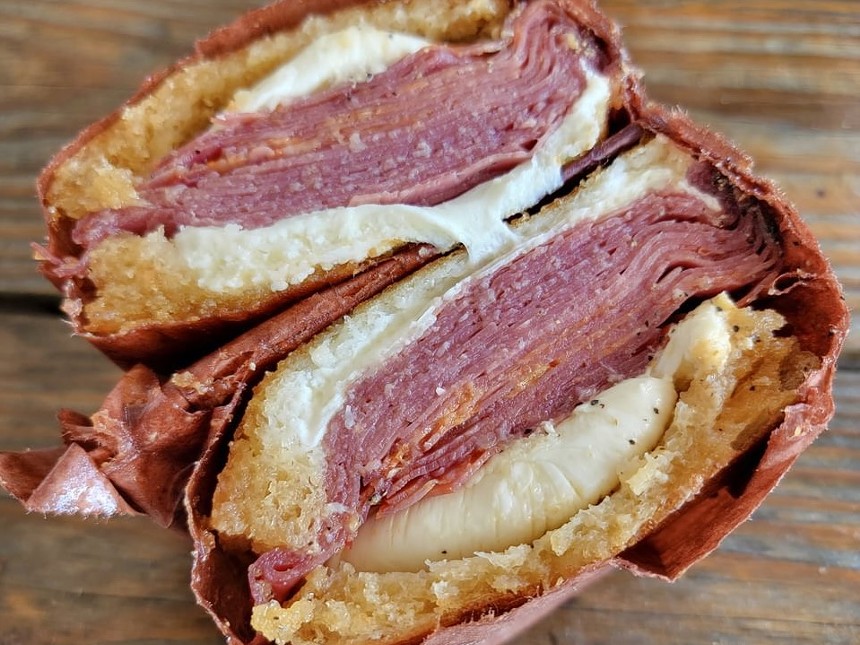 A meat and cheese sandwich