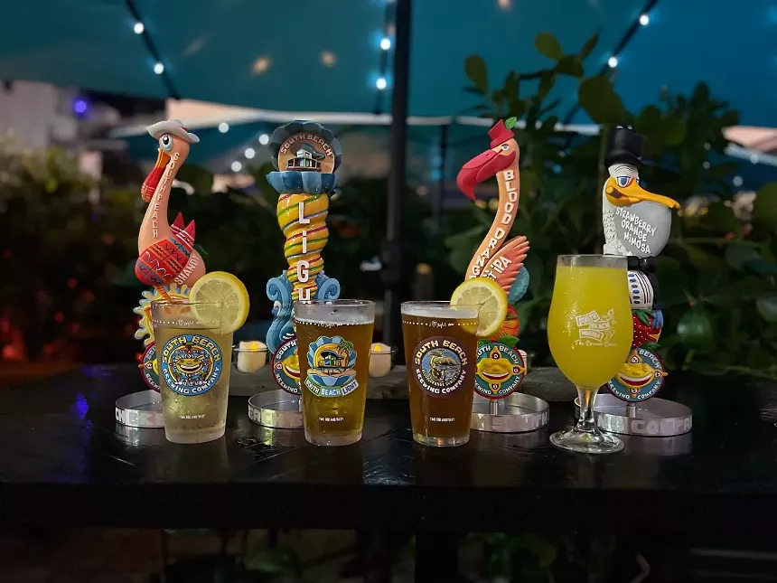 A flight of beers and quirky objects