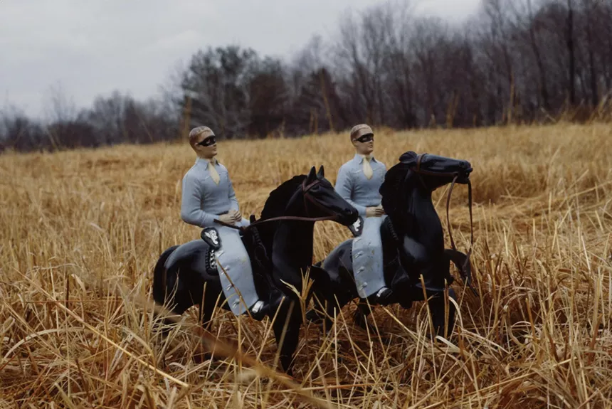Miniatures of two men riding horses