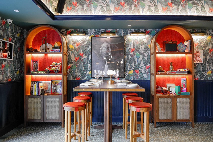 Red Rooster's seating is red and full of color