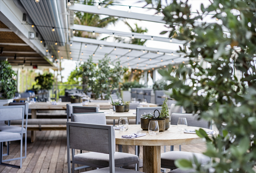 Outdoor seating area at Ocean Social at Eden Roc Miami Beach