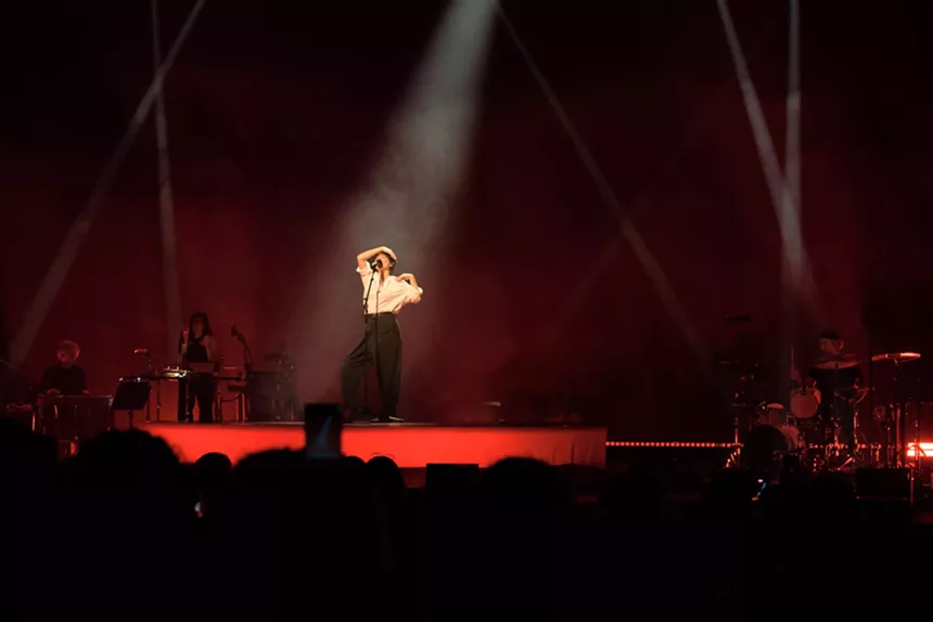 Mitski performing on stage