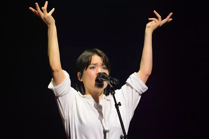 Mitski performing on stage