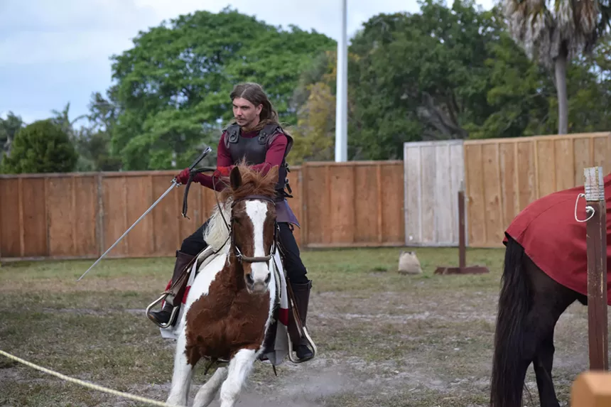 Jouster Caleb Austin Jordan riding atop a horse