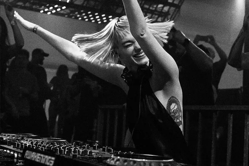 Estella Boersma behind the decks at a nightclub
