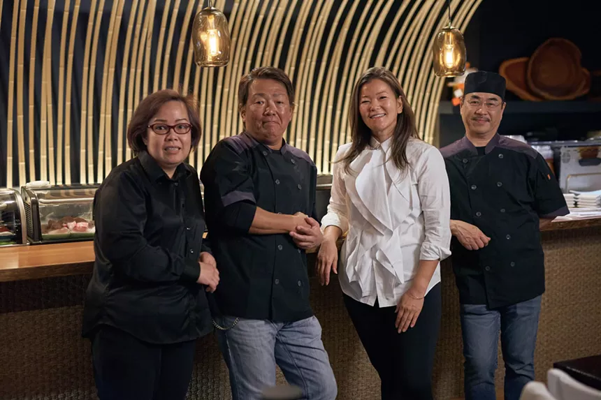 People posing for a photograph