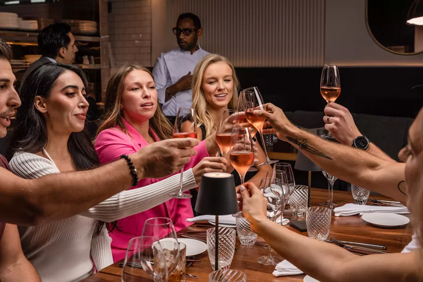 Girls cheering glasses