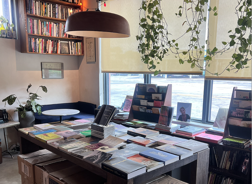 Table with books by a window