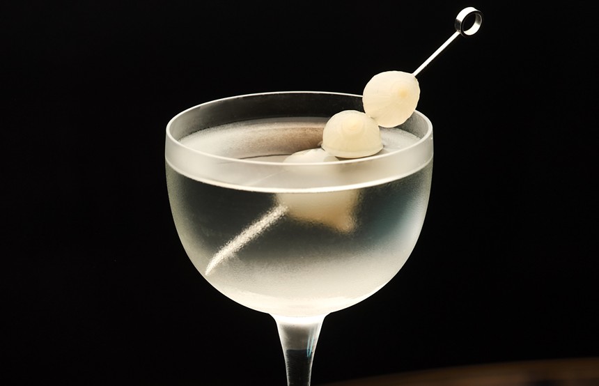 A white cocktail in a glass