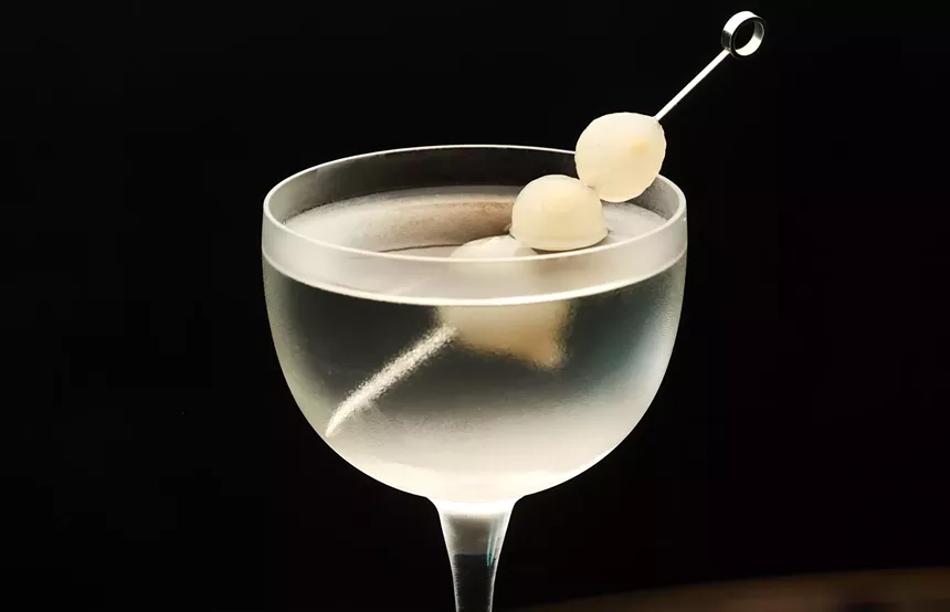 A white cocktail in a glass