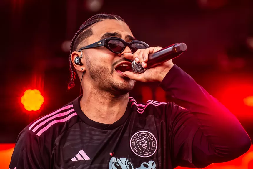 Alvaro Diaz singing into a microphone