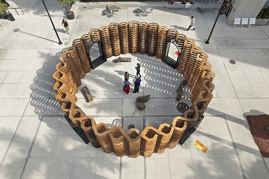 Circular structure made out of wood in a plaza