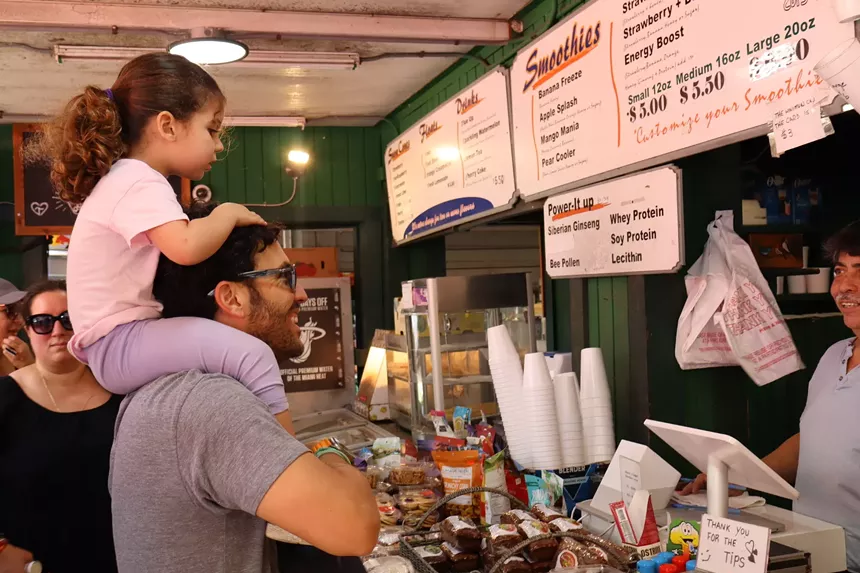 a man holding a child