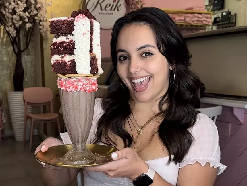 A woman holding ice cream