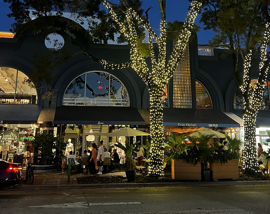 A brightly lit street at night