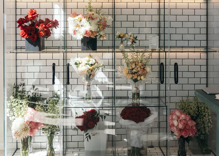 Floral arrangements on shelves