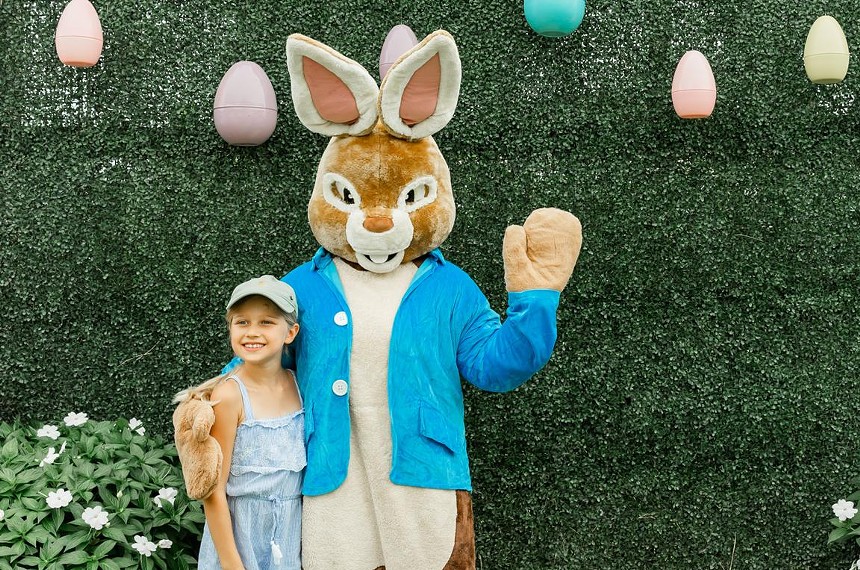 Child posing with the Easter Bunny