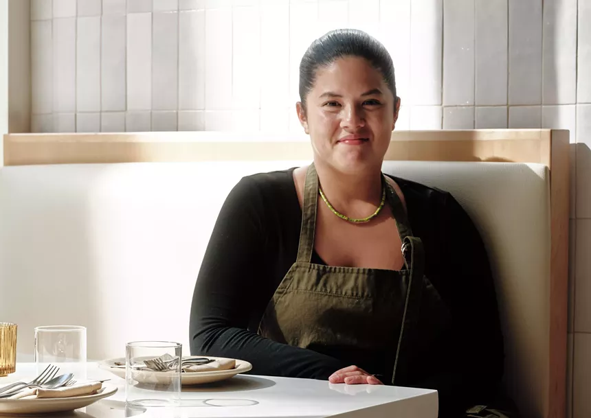 A woman sitting at a table