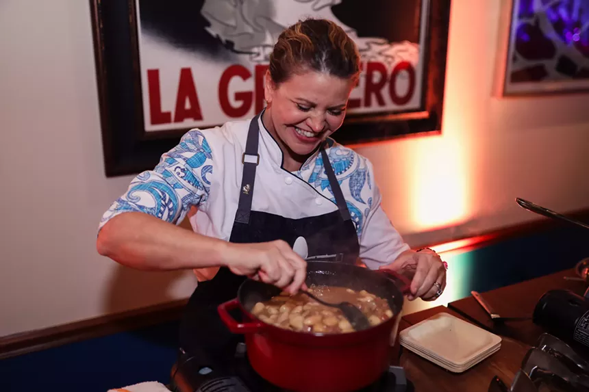 A woman preparing a dish