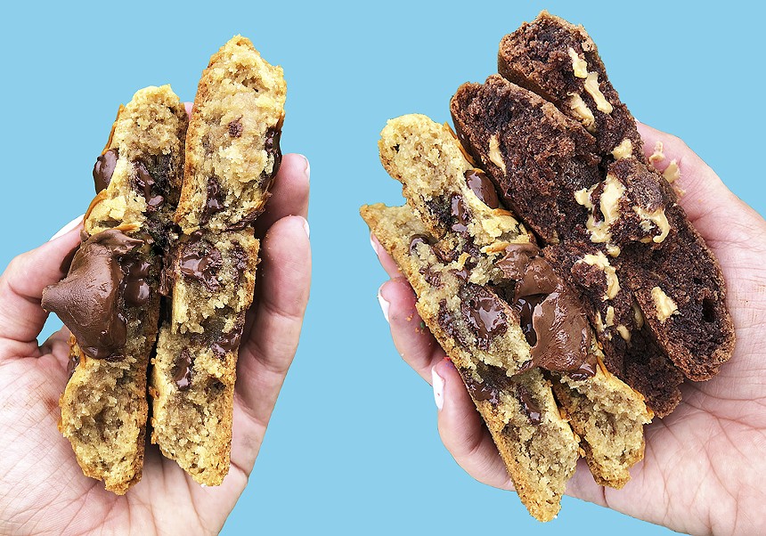 Cookies being held in half