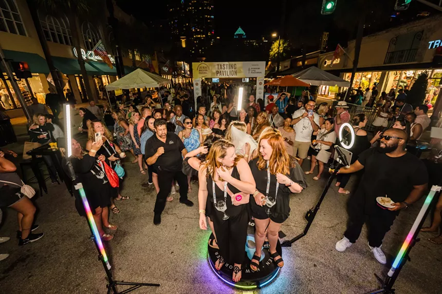 A crowd of people at night