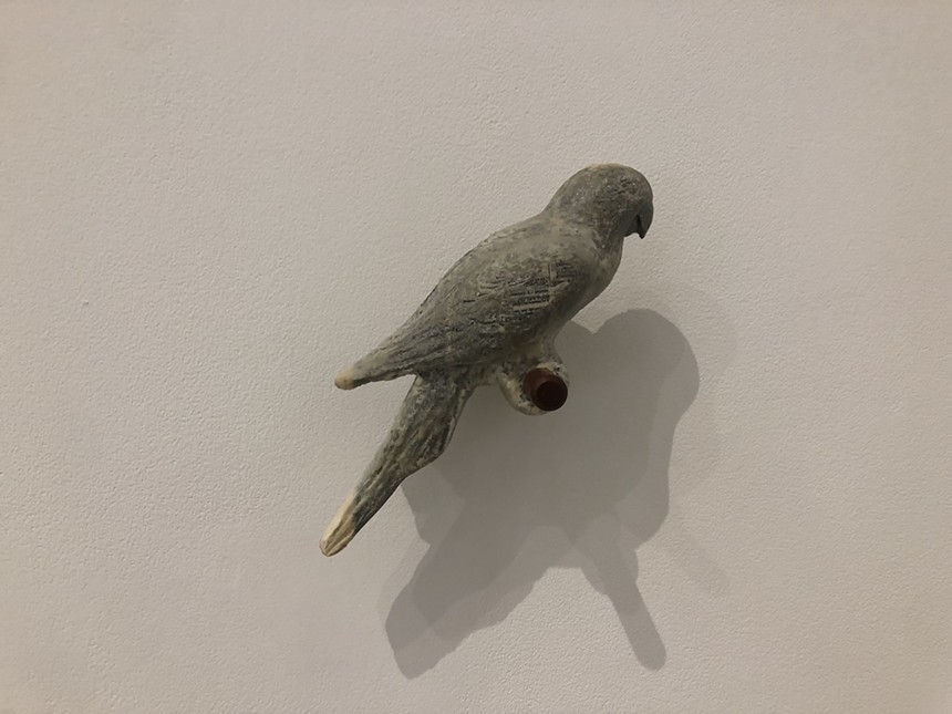 A bird carved out of wax