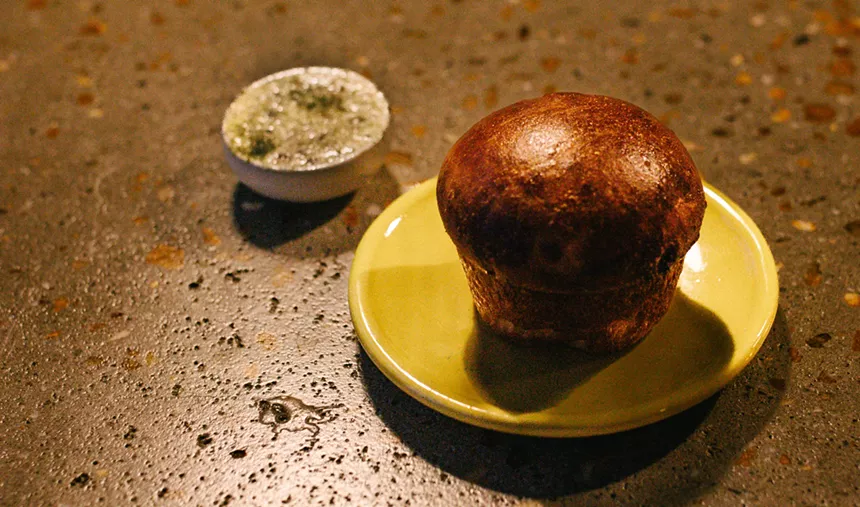 Bread and butter on table