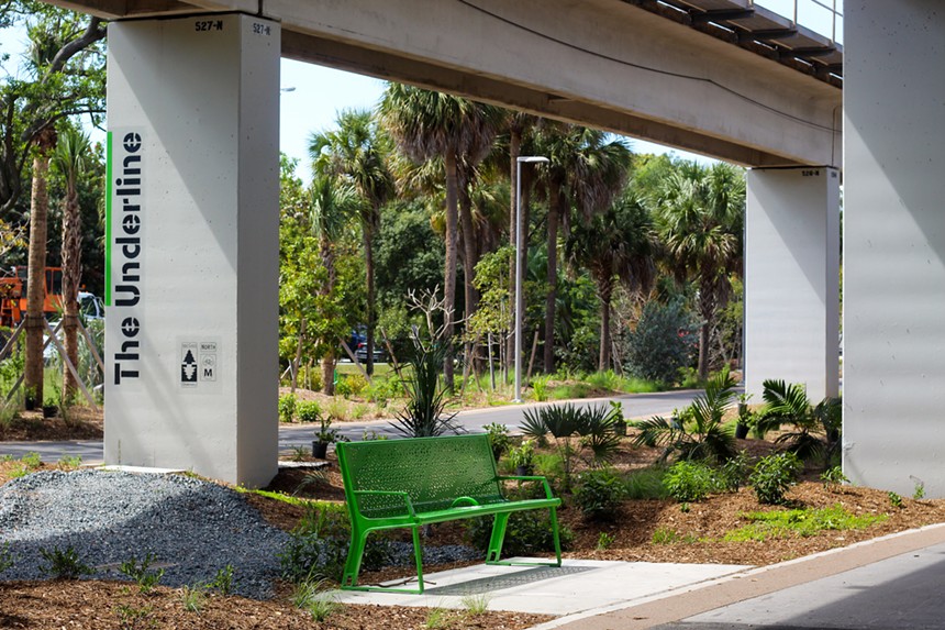 A green bench along the Underline