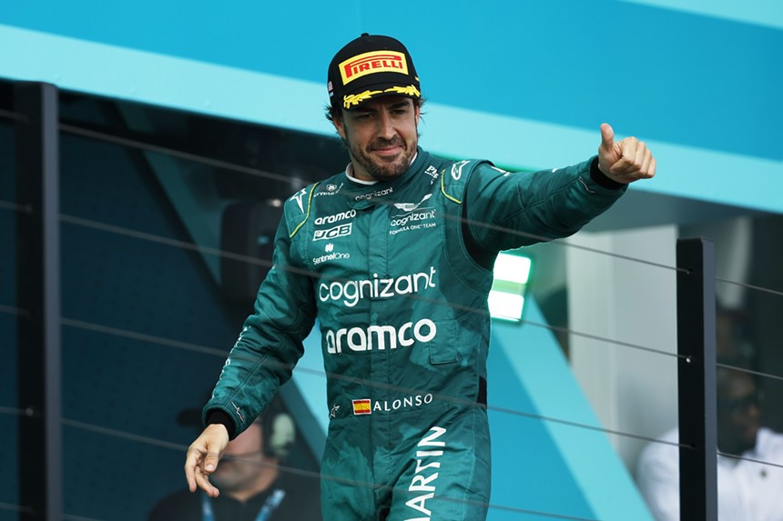 Fernando Alonso waving at fans at the Miami Grand Prix in 2023
