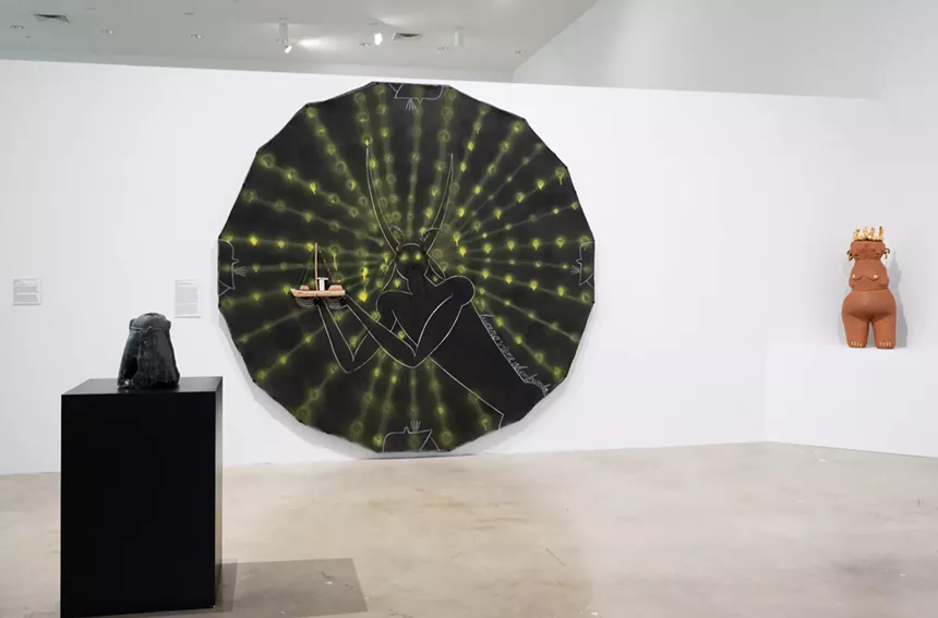 Jose Bedia's Lucero viene alumbrando hanging at the NSU Art Museum