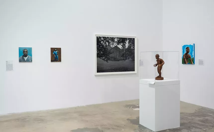 Art works by Reginald O'Neal and Dawoud Bey hanging at the NSU Art Museum