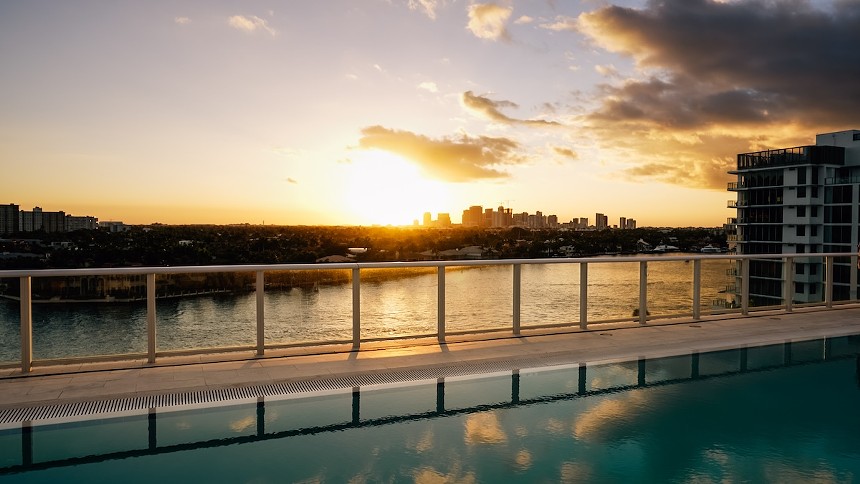 The skyline views from a rooftop terrace overlooking the water