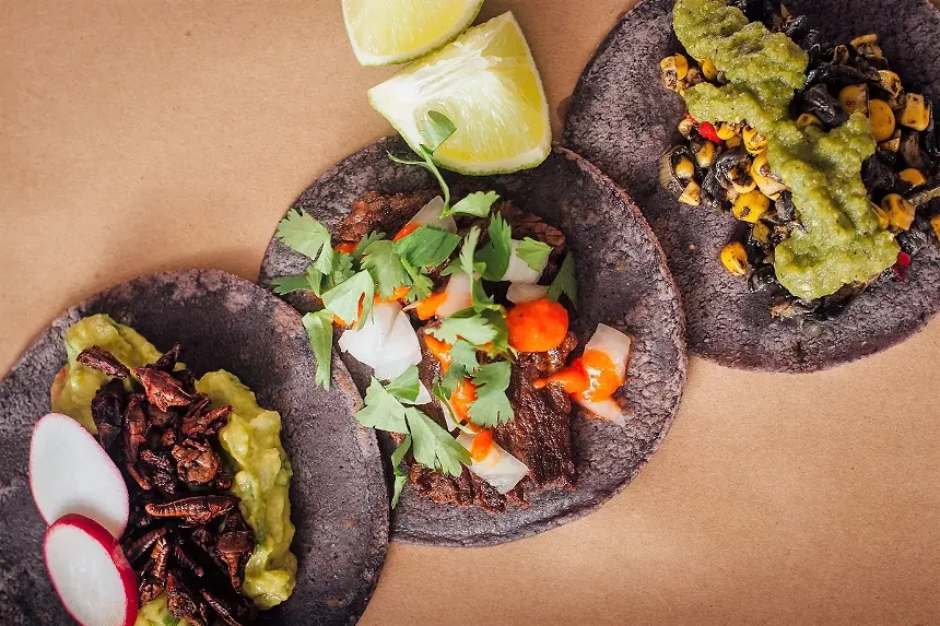 Tacos on a beige surface