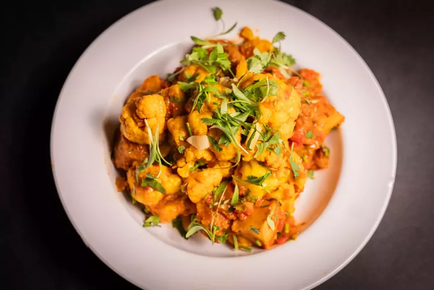 a yellow chicken dish